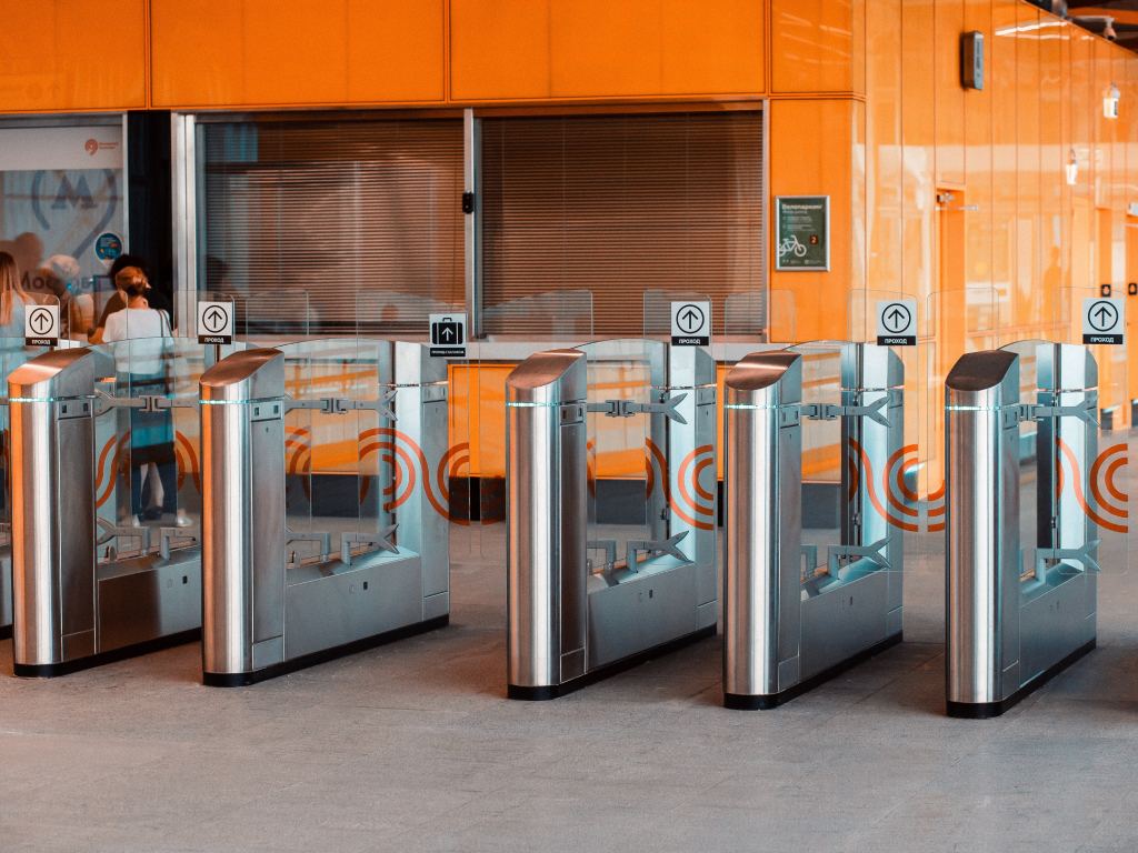 Electronic turnstiles at entrance to building