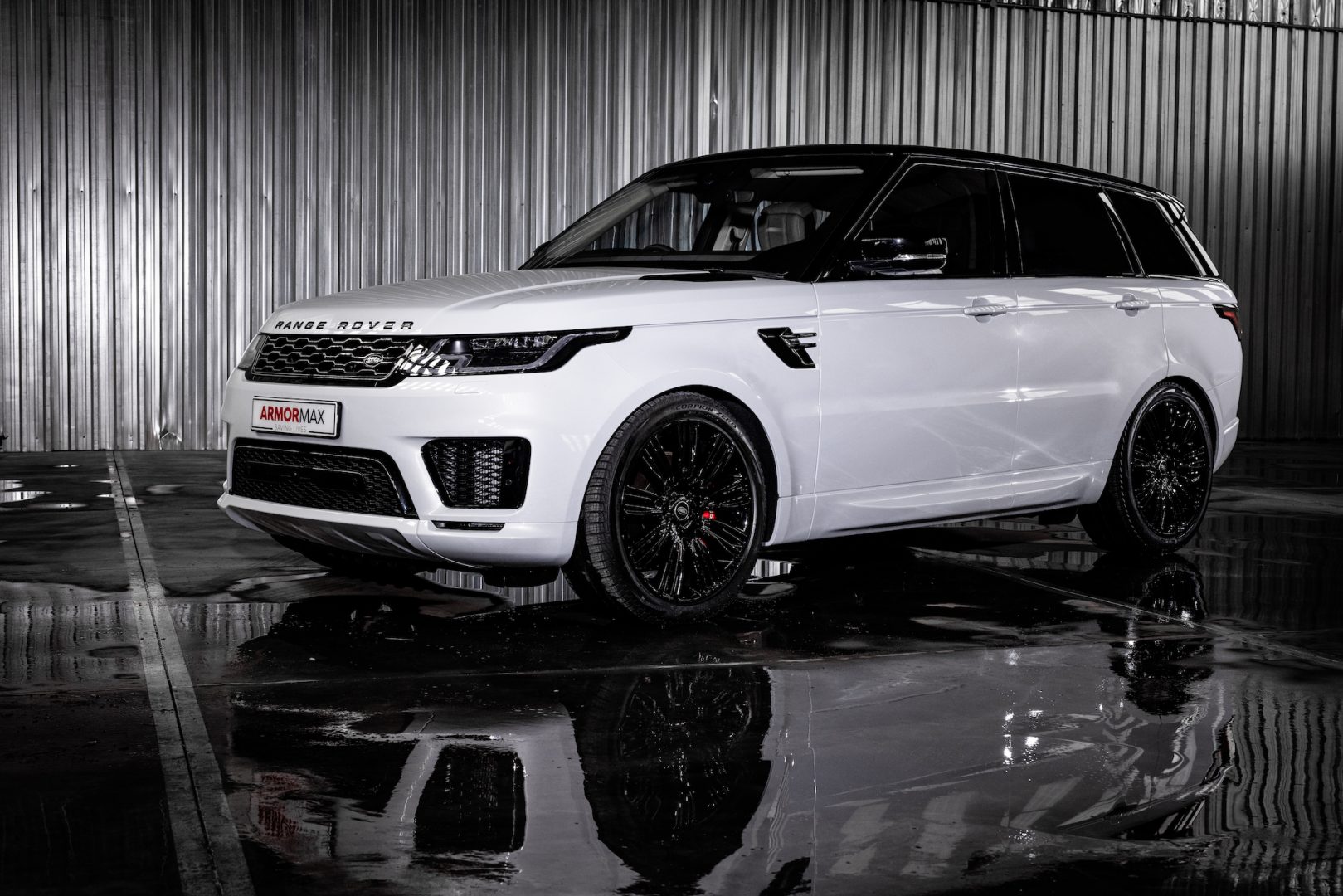 Armoured White Ranger Rover Sport in showroom