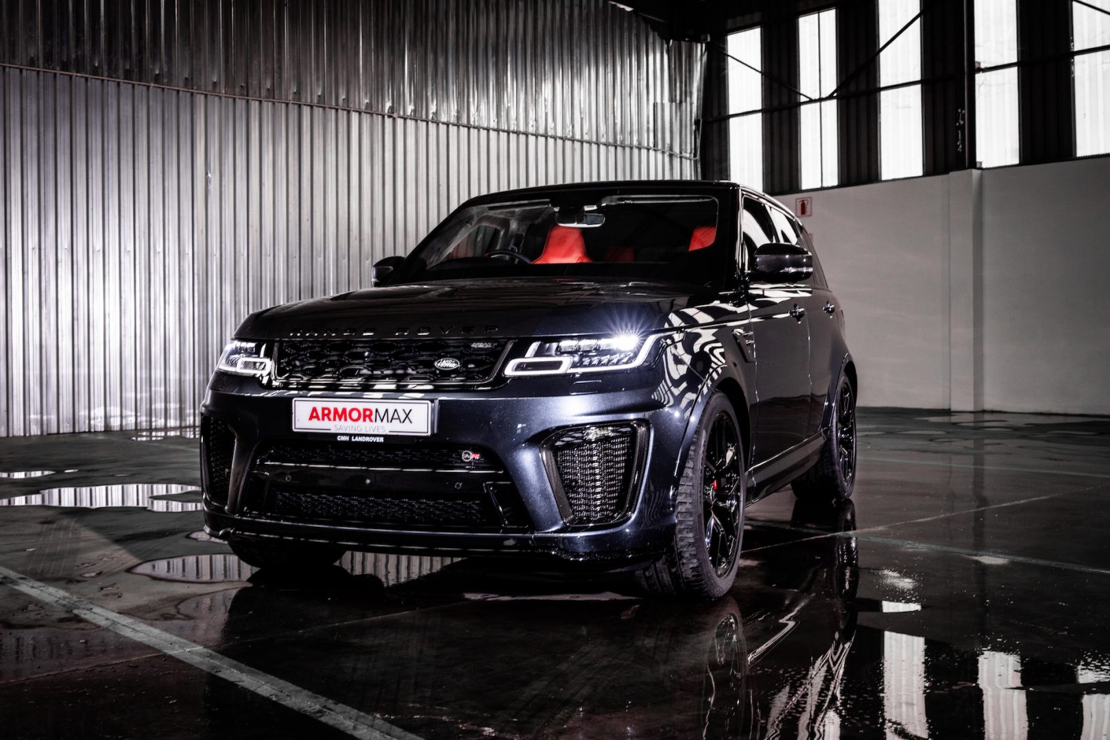 Armoured Blue Ranger Rover Sport in showroom